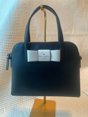 Kate Spade black satchel with white bow accent. Beautiful!